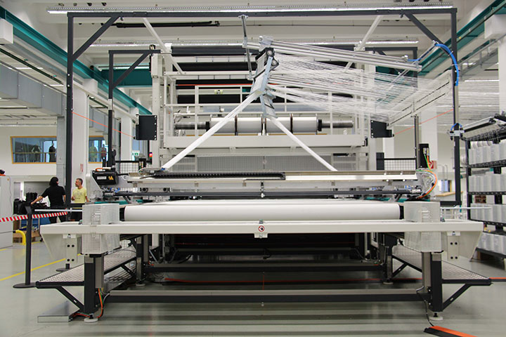 Karl Mayer’s integrated spreading and impregnation unit for carbon fibers
