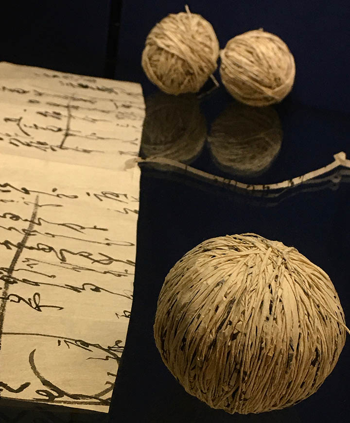 The original paper used in the making of ashehajiki was taken from used account books. These would have been painstakingly cut and the ink columns dispersed during the process of making the garment’s paper cordage. In the detail of Siân Bowen’s 
recreation of a Japanese ashehajiki garment, banana leaves are used to make abaca paper instead.   Photo courtesy Marie O’Mahony
