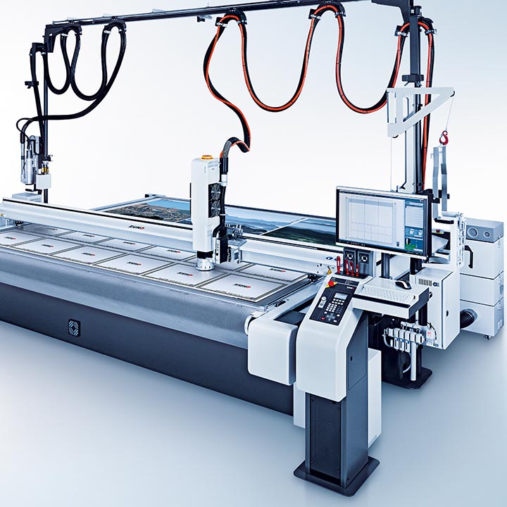 Zünd multi- functional cutting system with camera registration, laser cutting capabilities
