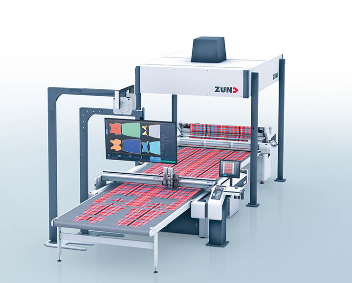 Zünd with cradle feeder for flawless, tension-free material advances with optional cross-cut function.