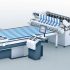 Zünd cutting system configured for textile cutting, pattern-matching, automatic nesting, and projection-assisted picking & sorting.