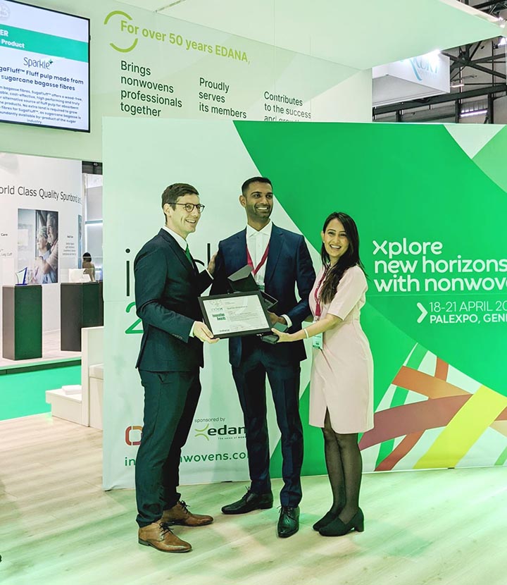 Sparkle Innovations co-founders Chirag and Hetal Virani receive the INDEX 2023 Sustainable Product Award from Gil Stevens, external relations and sustainability director for INDEX 2023 show owner EDANA. Photo courtesy EDANA