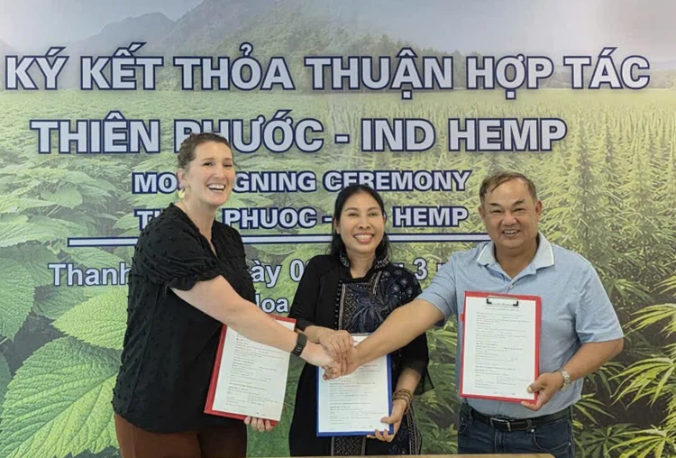 (Left to Right) IND HEMP CEO Morgan Tweet, Thien Phuoc Owner Ms. Thuy and Summit International Trade Owner Mr. Thanh celebrate the signing of an MOU (memorandum of understanding) outlining a farm to fashion hemp fiber textile supply chain collaboration with U.S. grown hemp fiber supplying Vietnamese textile industry.