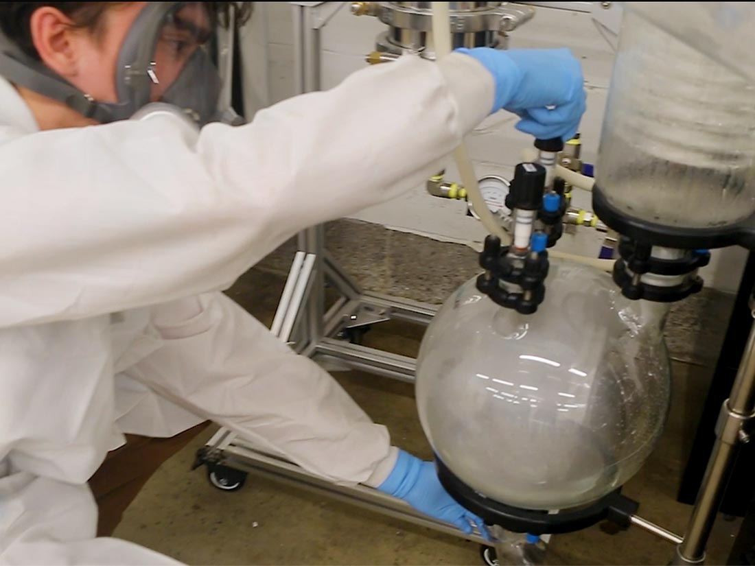 A Claros scientist de-stills PFAS waste to a highly concentrated solution, making it more cost-effective and efficient to destroy in high quantities.