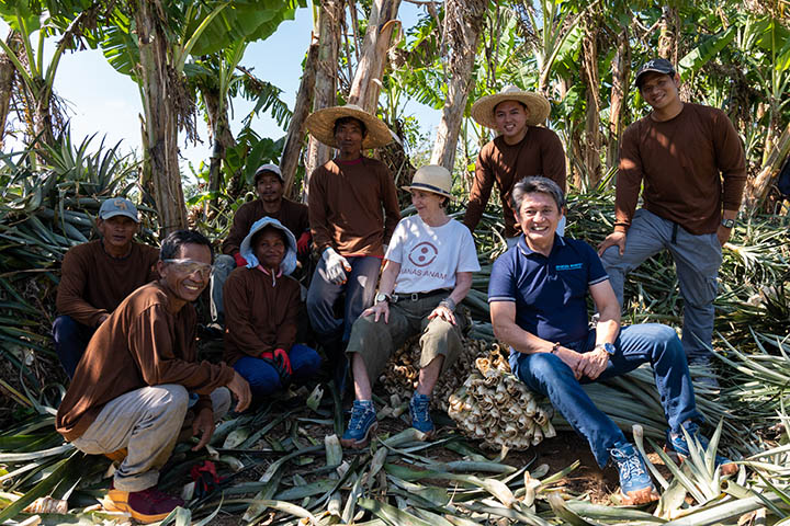 Founder Dr. Carmen Hijosa (also at right) with pineapple leaf harvesters in the fields in the Philippines. Photo courtesy Ananas Anam