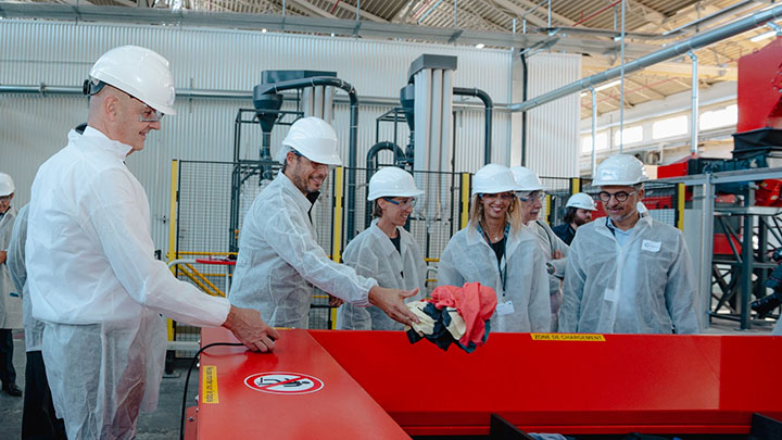 French Minister for Industry Roland Lescure (left) with representatives of partner brands and Carbios CEO Emmanuel Ladent (far right) at the opening of the company’s new fiber preparation line. Photo courtesy of Carbios