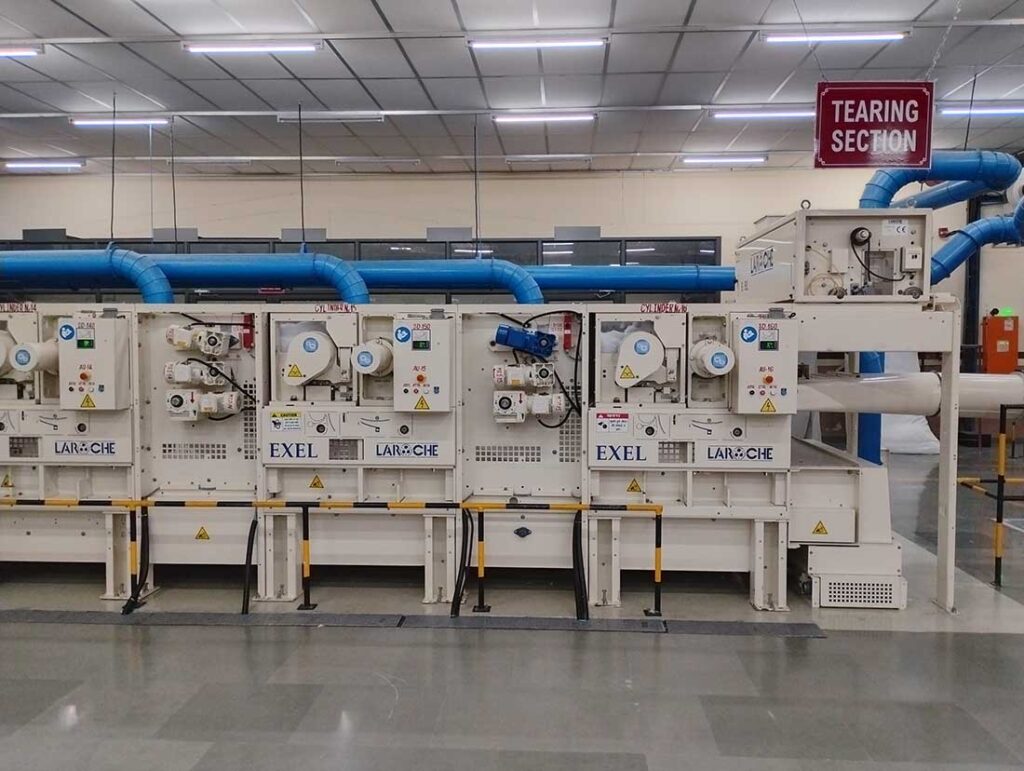 The ReNova™ recycled fiber processing plant; the bale press machine; and the equipment used to tear the fabrics during the recycling process. Photos courtesy of ReNova