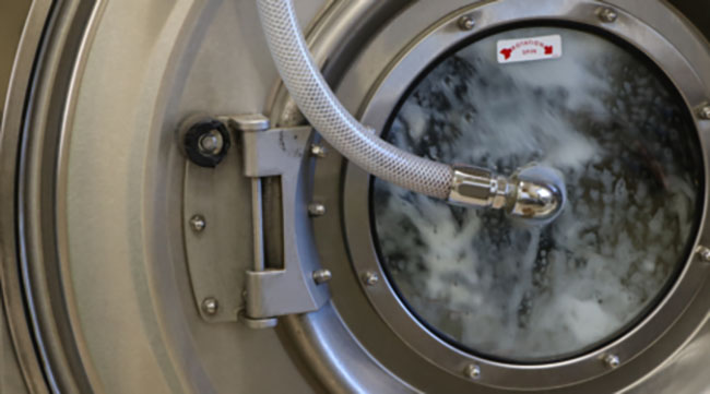 Care providers like Gear Wash use specialized PPE laundering equipment and third-party-verified cleaning processes to help remove contaminants while protecting the integrity of firefighting gear.