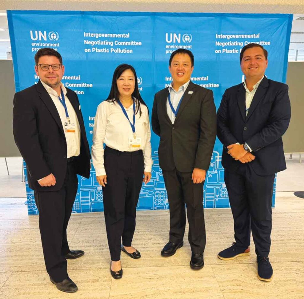 Wes Fisher with colleagues at the UN plastics treaty negotiations.